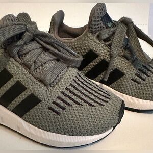 Green Adidas. Kids never worn.